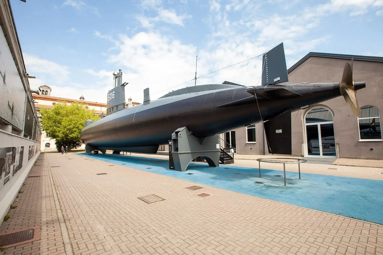 The Enrico Toti submarine displayed in the outdoor courtyard of Milan's science museum
