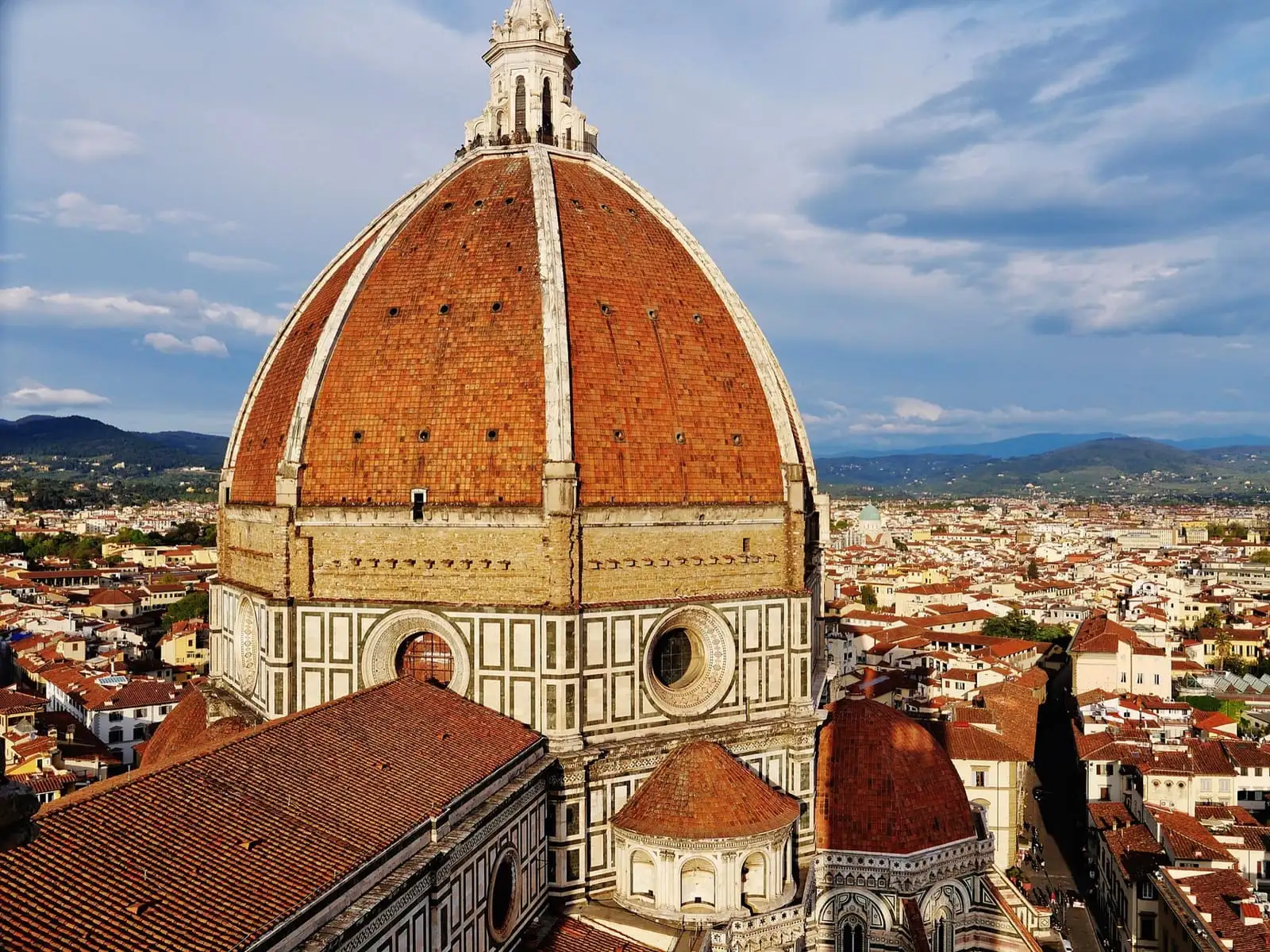 Brunelleschi's dome of Florence Cathedral above the city rooftops, seen from Giotto's bell tower