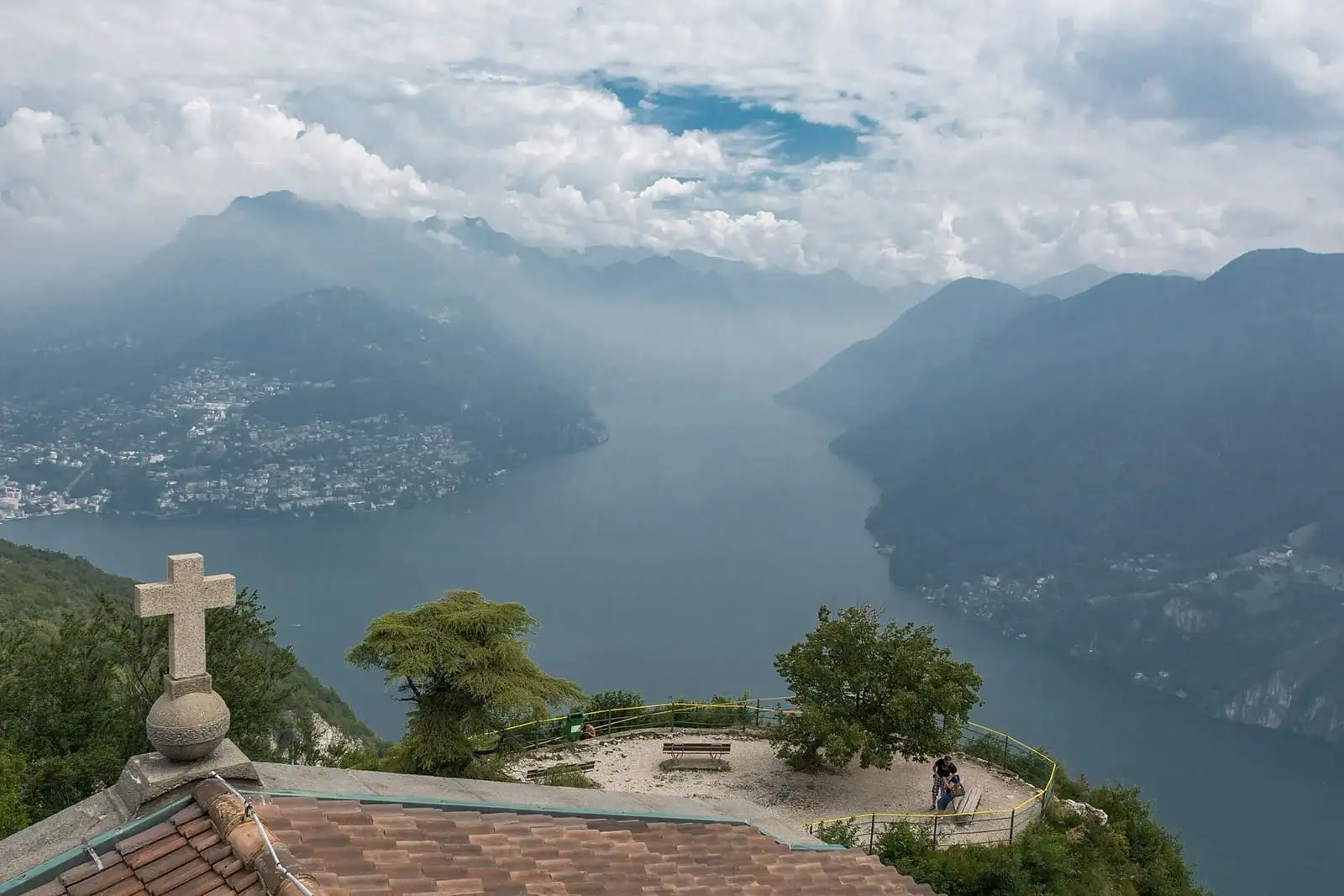 Lake Lugano and the city of Lugano seen from the summit terrace of Monte San Salvatore