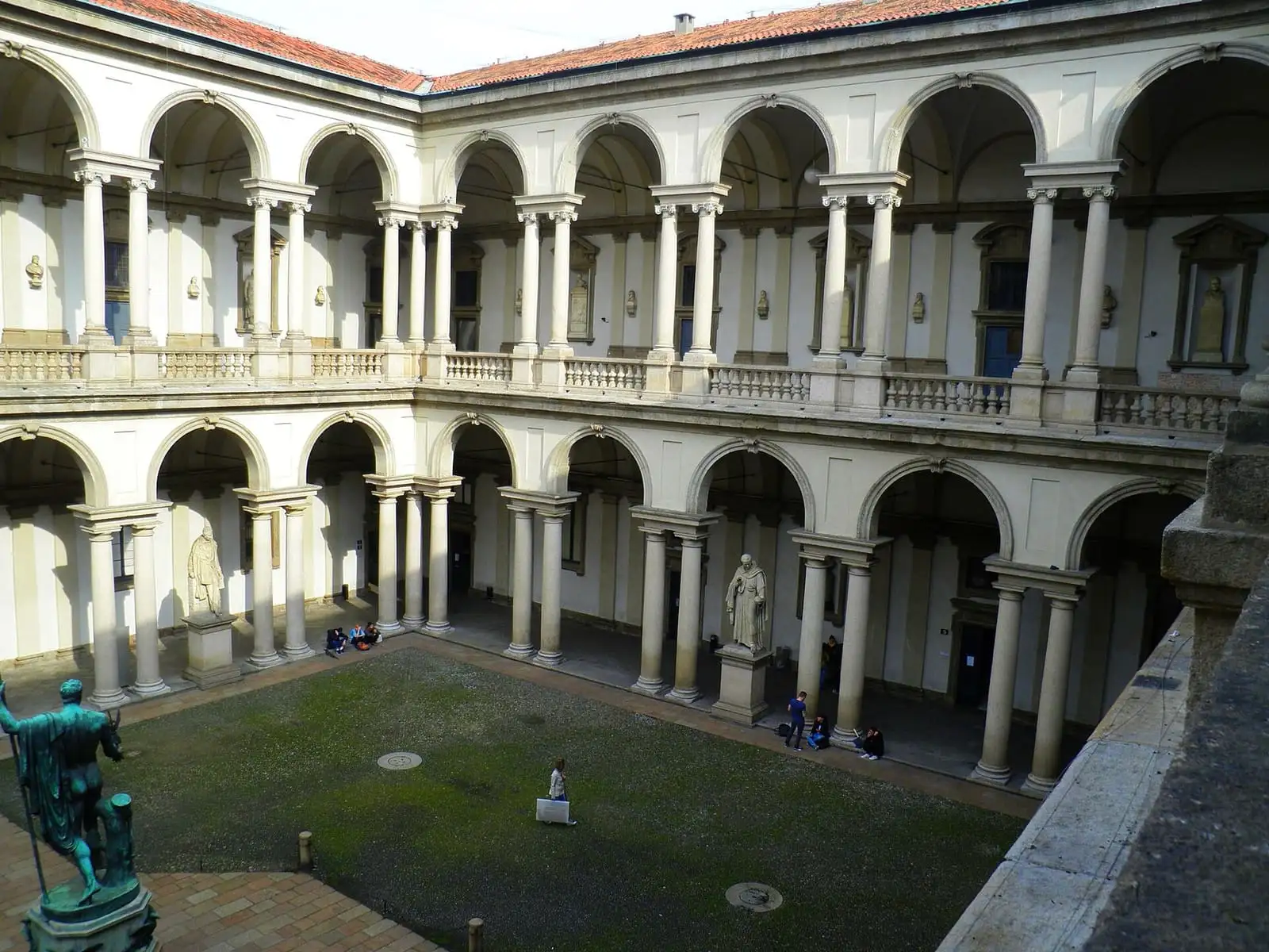 Arcaded courtyard of the Palazzo di Brera, home of the Pinacoteca di Brera, with the Napoleon statue