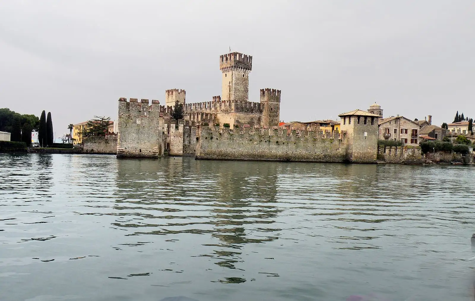 The Scaligero Castle of Sirmione rising from the water of Lake Garda