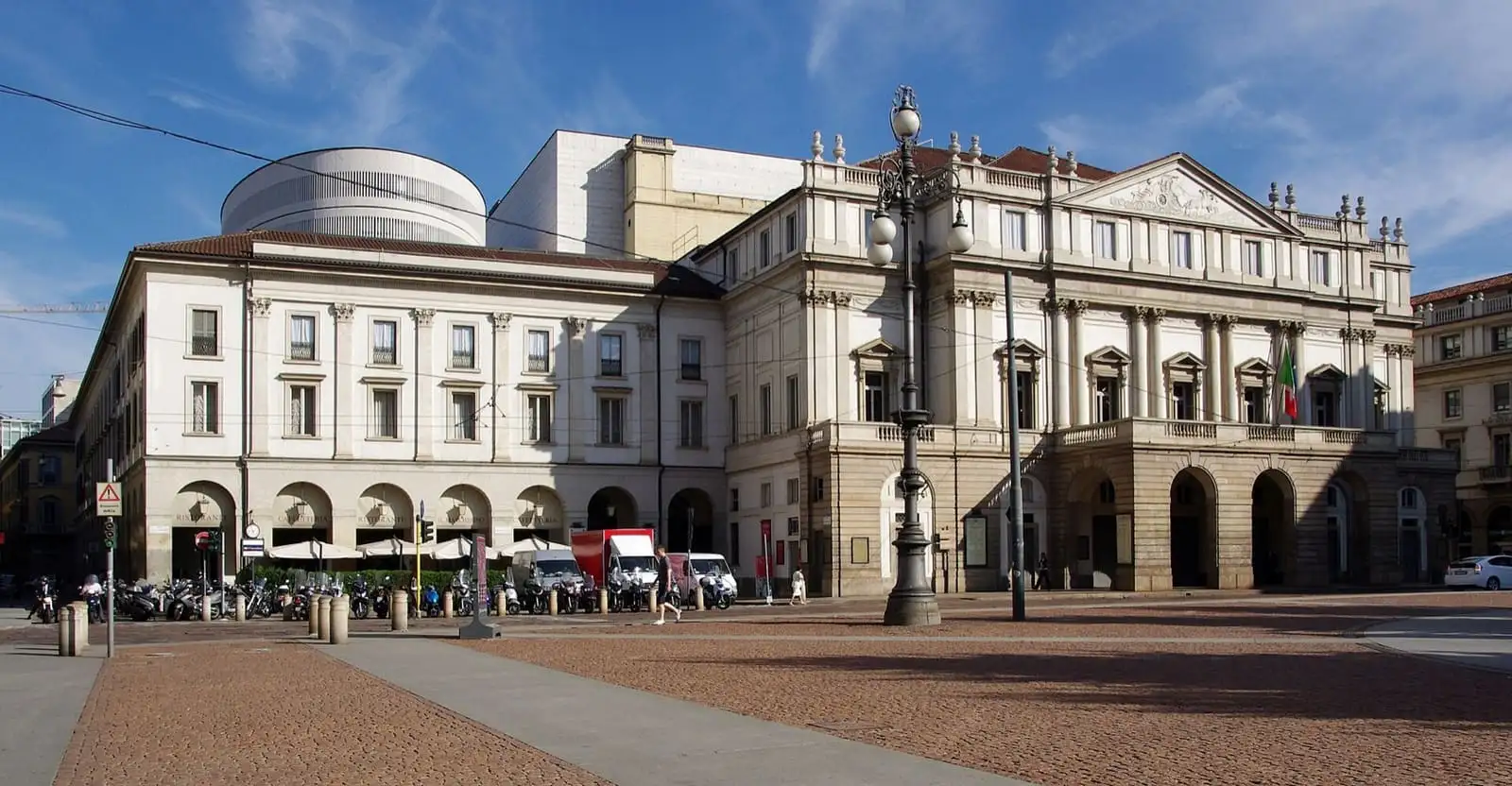 Neoclassical facade of the Teatro alla Scala opera house on Piazza della Scala, Milan